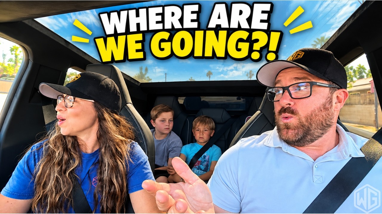 Andy, his wife, and their children talking inside the Cybertruck